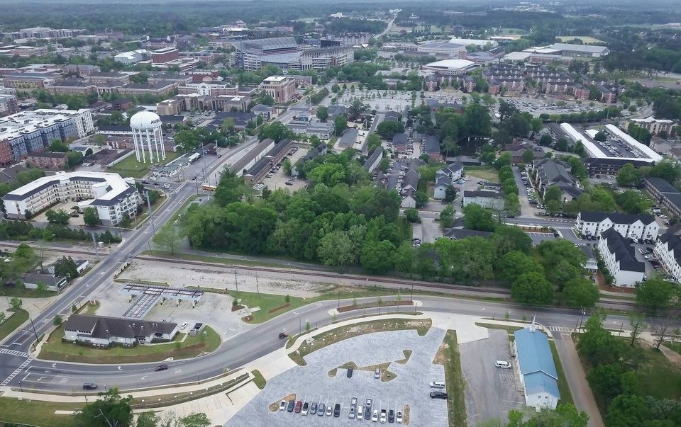 Aerial view of the Donahue lot at Highway 14, with Jordan-Hare Stadium and the Auburn campus behind it